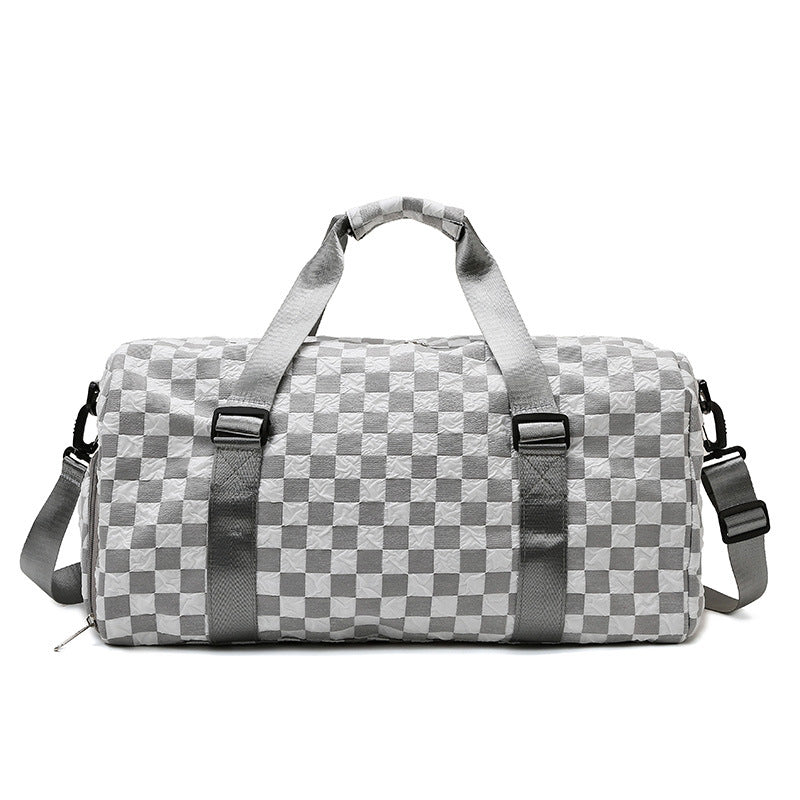Introducing our practical Fashion Plaid Workout Gym Bag! This stylish and durable bag is perfect for all your gym essentials. With multiple compartments and a comfortable shoulder strap, you'll have everything you need for a successful workout. Stay fashionable while staying fit with our must-have gym bag.