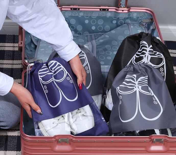 Organize and protect your shoes with our Drawstring Shoe Storage Bag. Made of durable fabric, this bag features a drawstring closure to keep your shoes secure and dust-free. Ideal for travel or storing at home. Keep your shoes in pristine condition with our convenient shoe storage solution.
